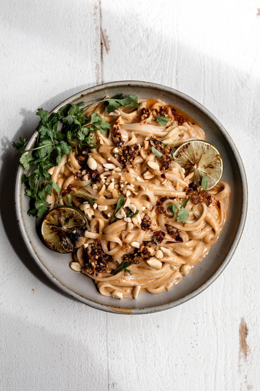 Thai-inspired peanut noodles with charred limes