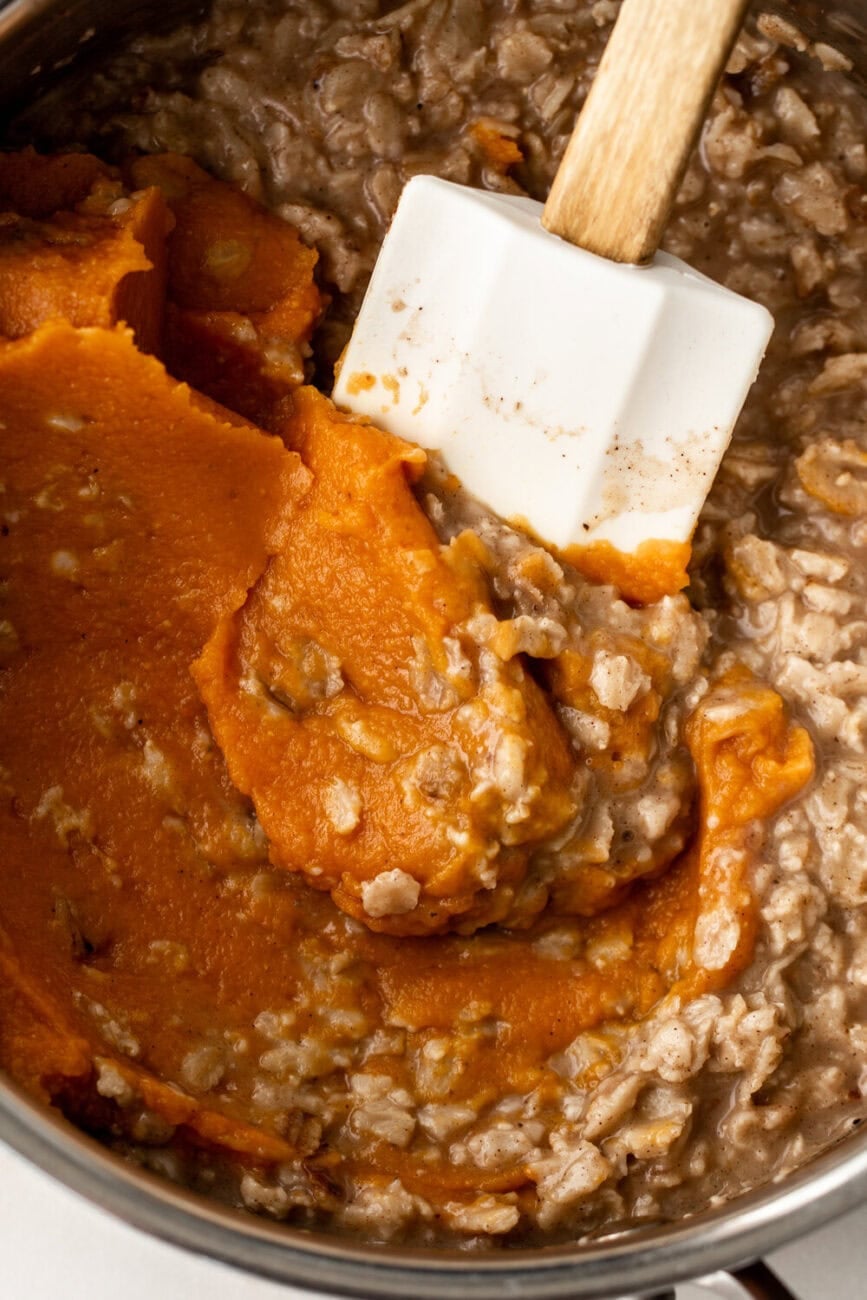 pumpkin puree mixed into pumpkin spice oatmeal.