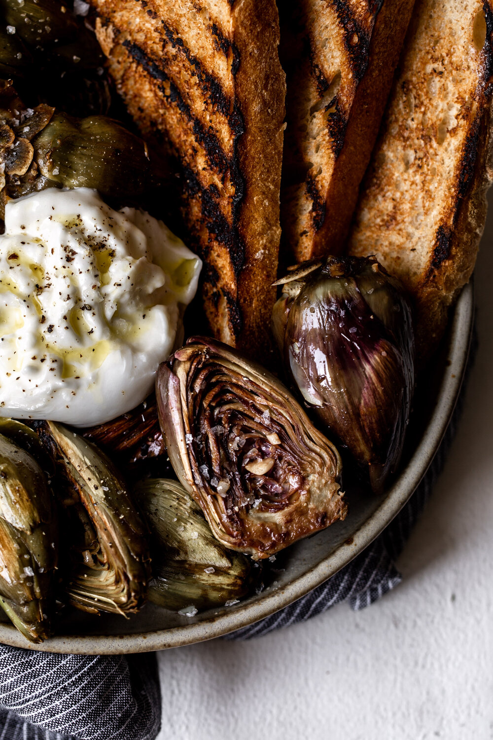 Quick Braised Baby Artichokes with Burrata and grilled bread