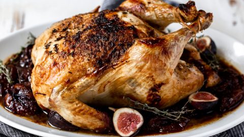 trussed chicken with caramelized onions and figs in port wine glaze