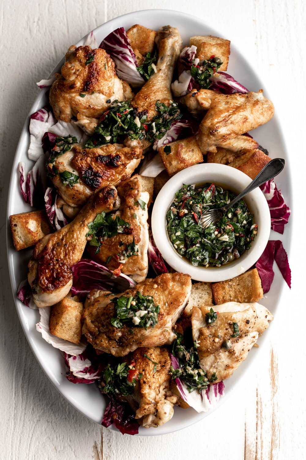 Roasted Chicken with Italian Salsa Verde on platter