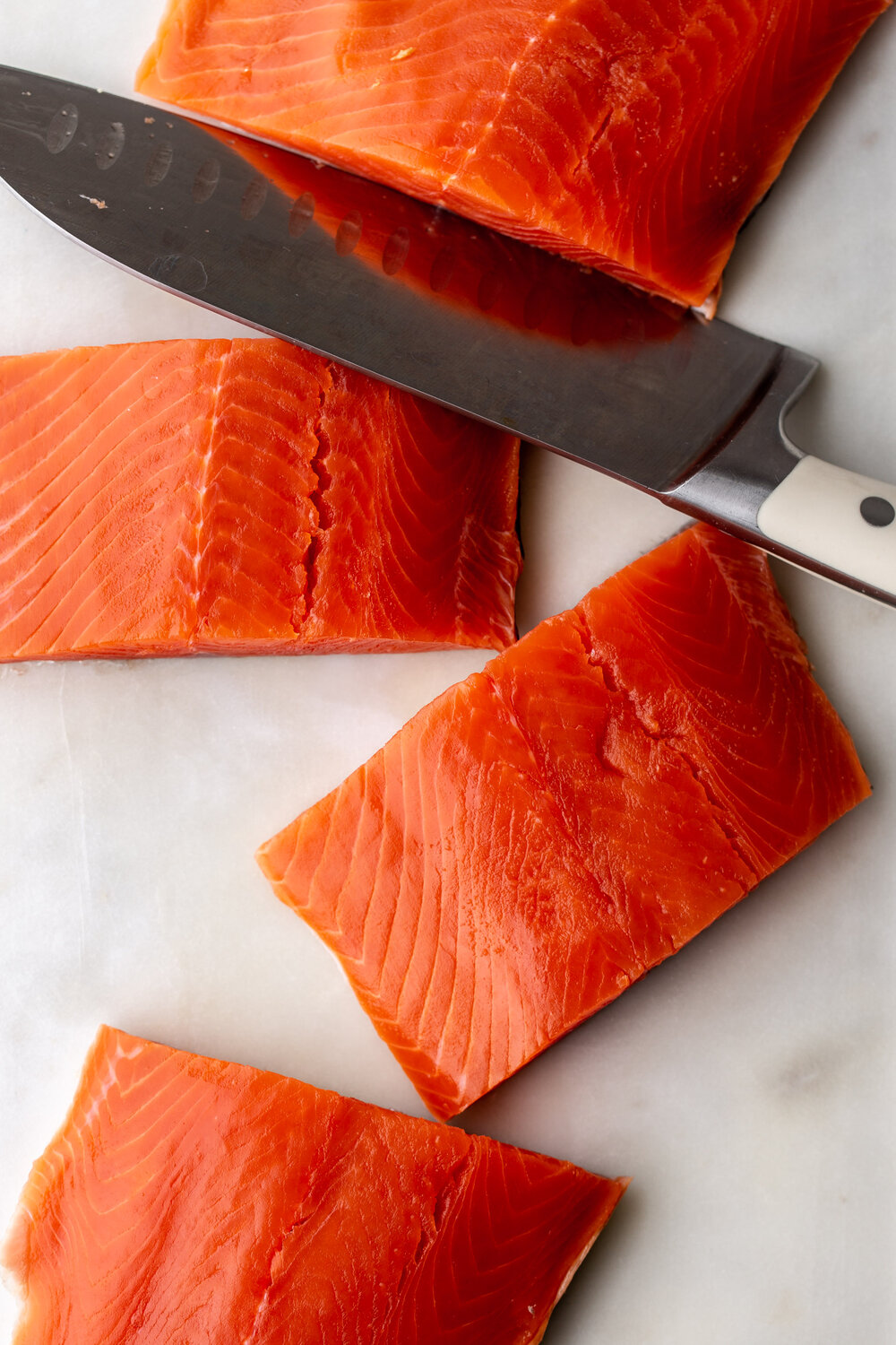 wild alaskan salmon cut into fillets 