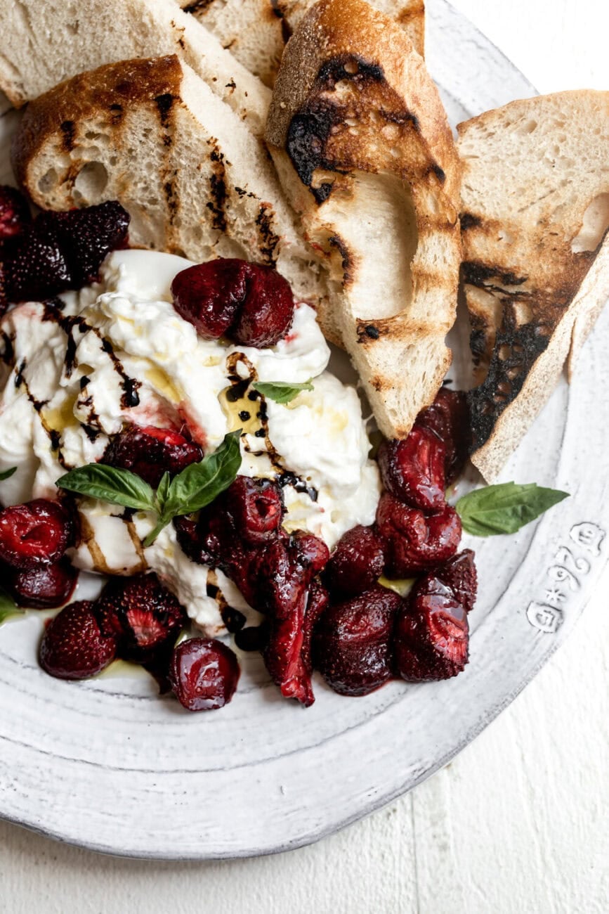 Roasted Strawberries with Burrata & Balsamic with grilled bread.