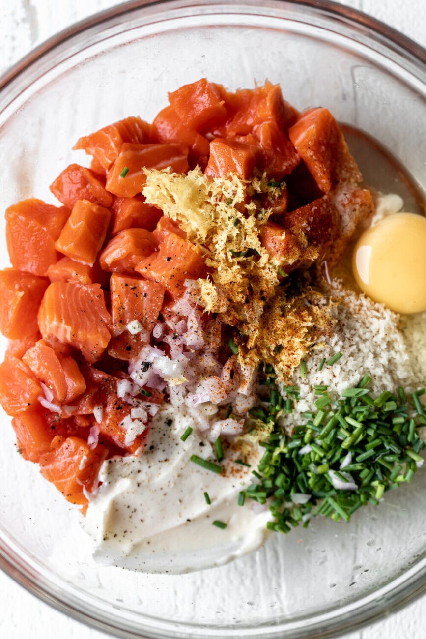 salmon cakes ingredients in large mixing bowl.