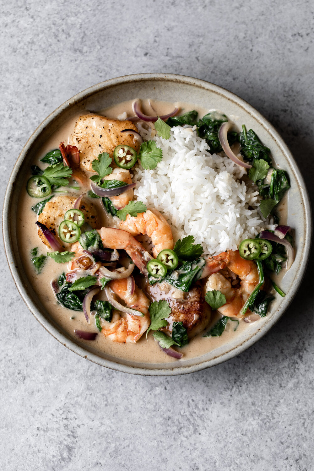 Sautéed shrimp and scallops served in a tangy miso lime coconut sauce over jasmine rice