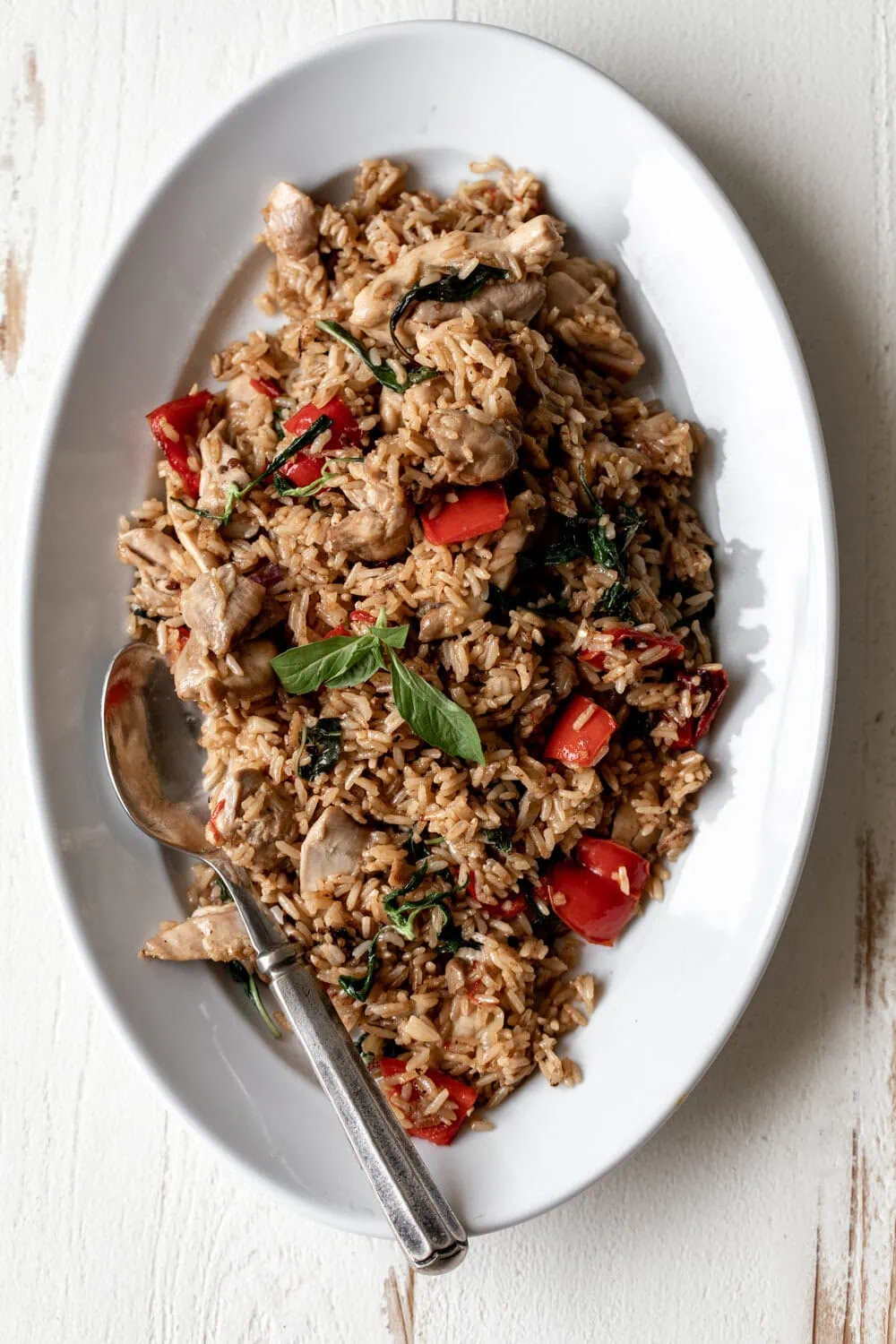 Spicy Basil Fried Rice with Chicken on white platter 