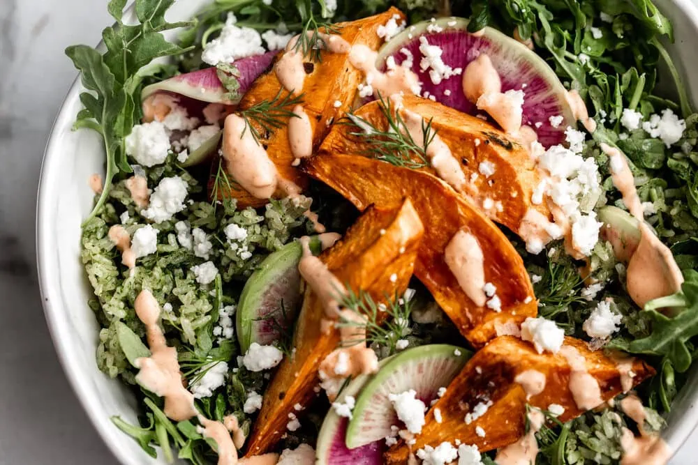 Spicy Green Herbed Crispy Rice Sweet Potato Bowl with Spicy Yogurt and watermelon radish