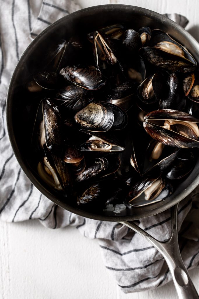 Steamed Mussels in Saffron Chorizo Broth Cooking with Cocktail Rings