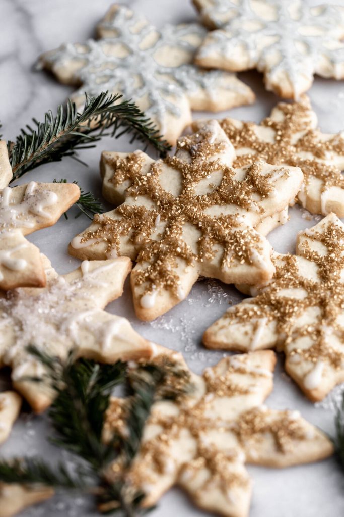 Classic Sugar Cookies snowflake cookie cutter with gold and silver sprinkles decoration best christmas cookie recipes