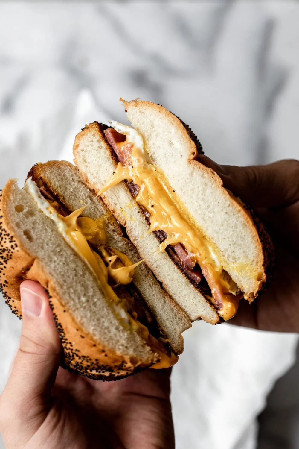Taylor ham egg and cheese opening sandwich cheese pull