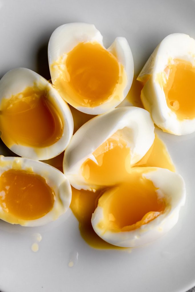 soft boiled eggs halved