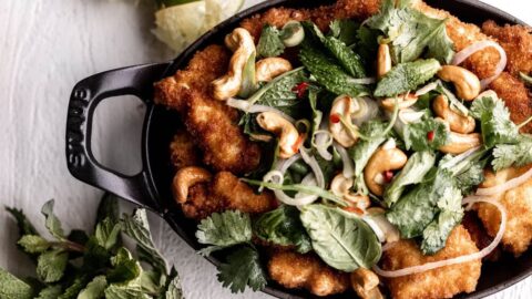 Thai Fried Red Snapper recipe with herb salad and cashews.