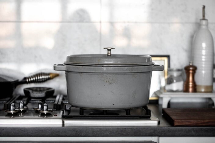 essential kitchen tools every cook should own dutch oven on stove.