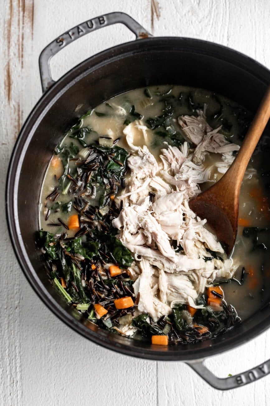 turkey soup with wild rice topped with shredded turkey breast.