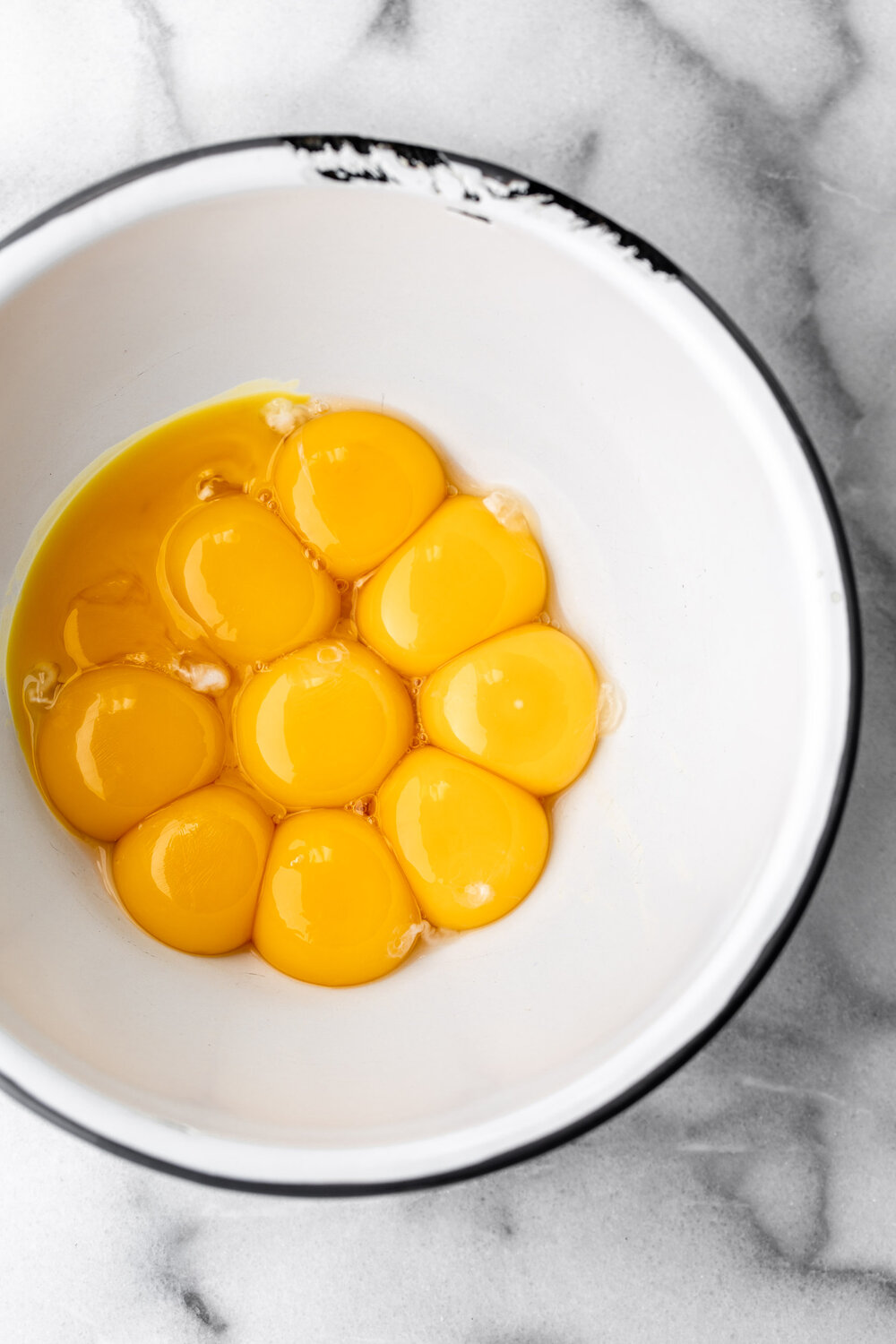 egg yolks in mixing bowl