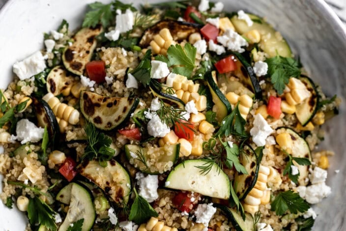 vegetable quinoa salad with zucchini and feta.