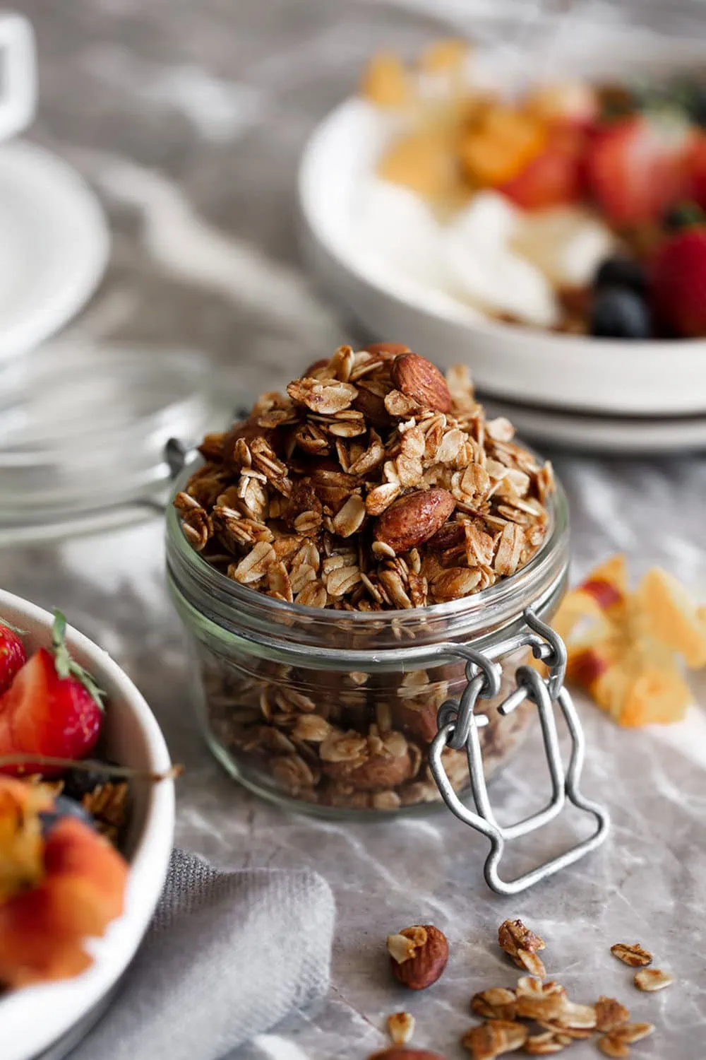 honey almond granola in small glass jar
