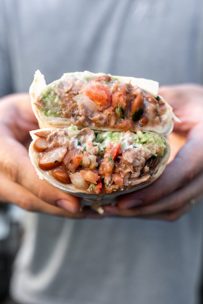 la taqueria san francisco mission style burritos with carnitas and refried beans