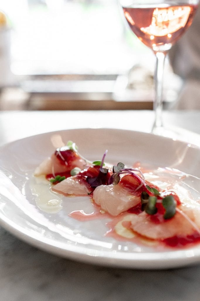 thinly sliced scallop crudo.