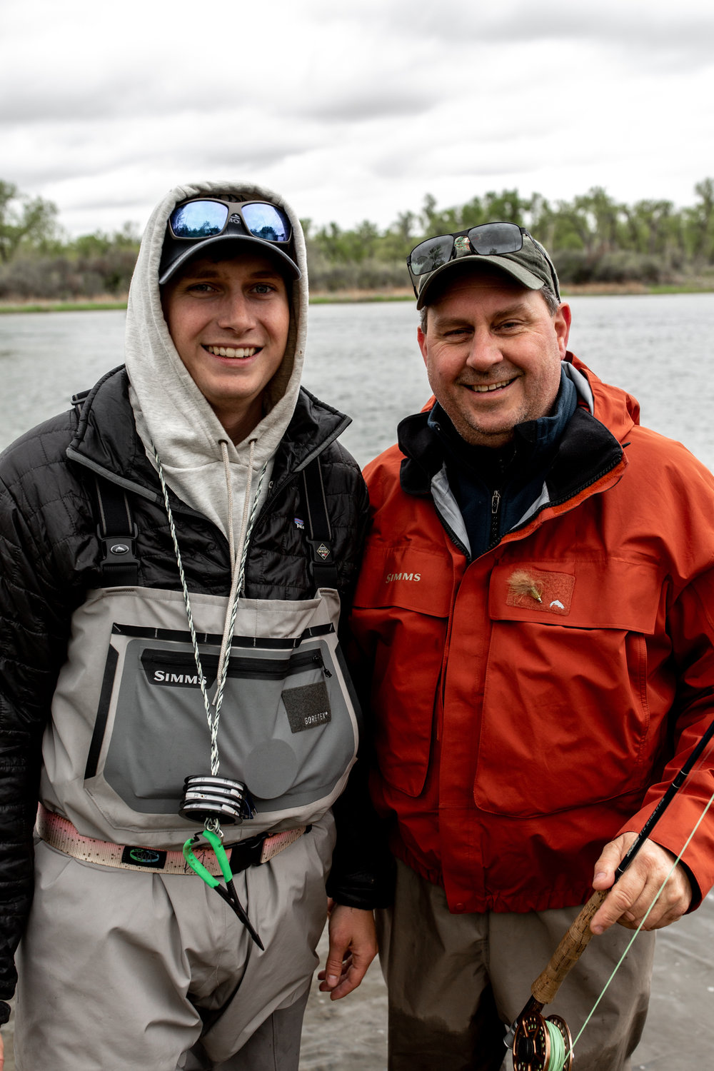 josh and dad in fishing gear