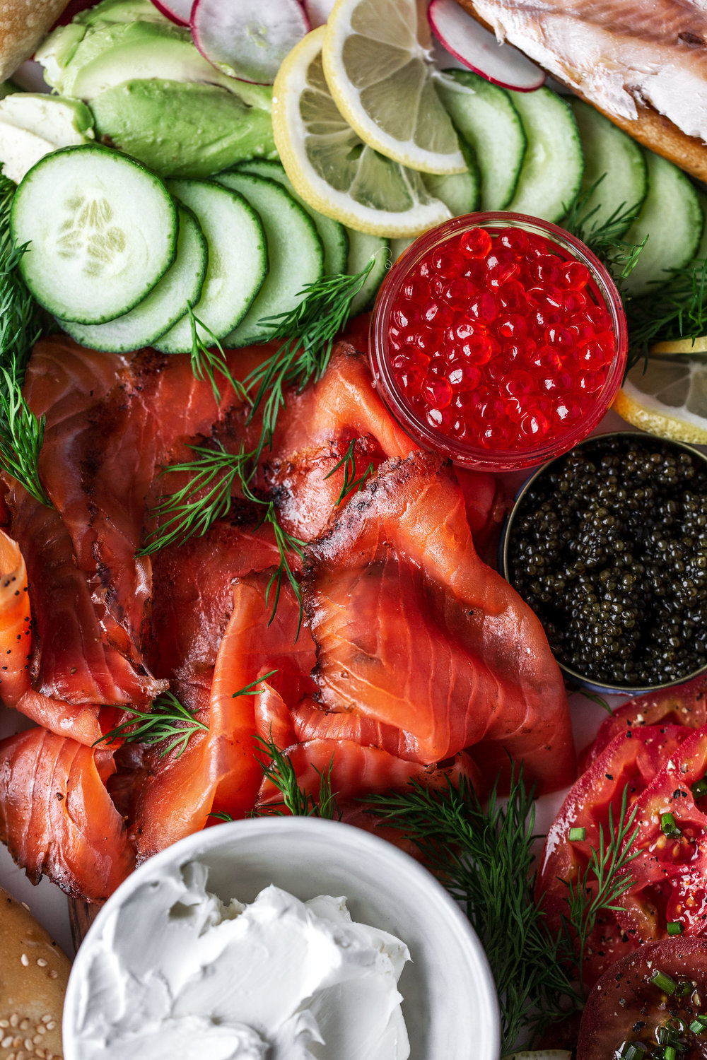 smoked salmon lox, caviar, salmon roe bagel brunch