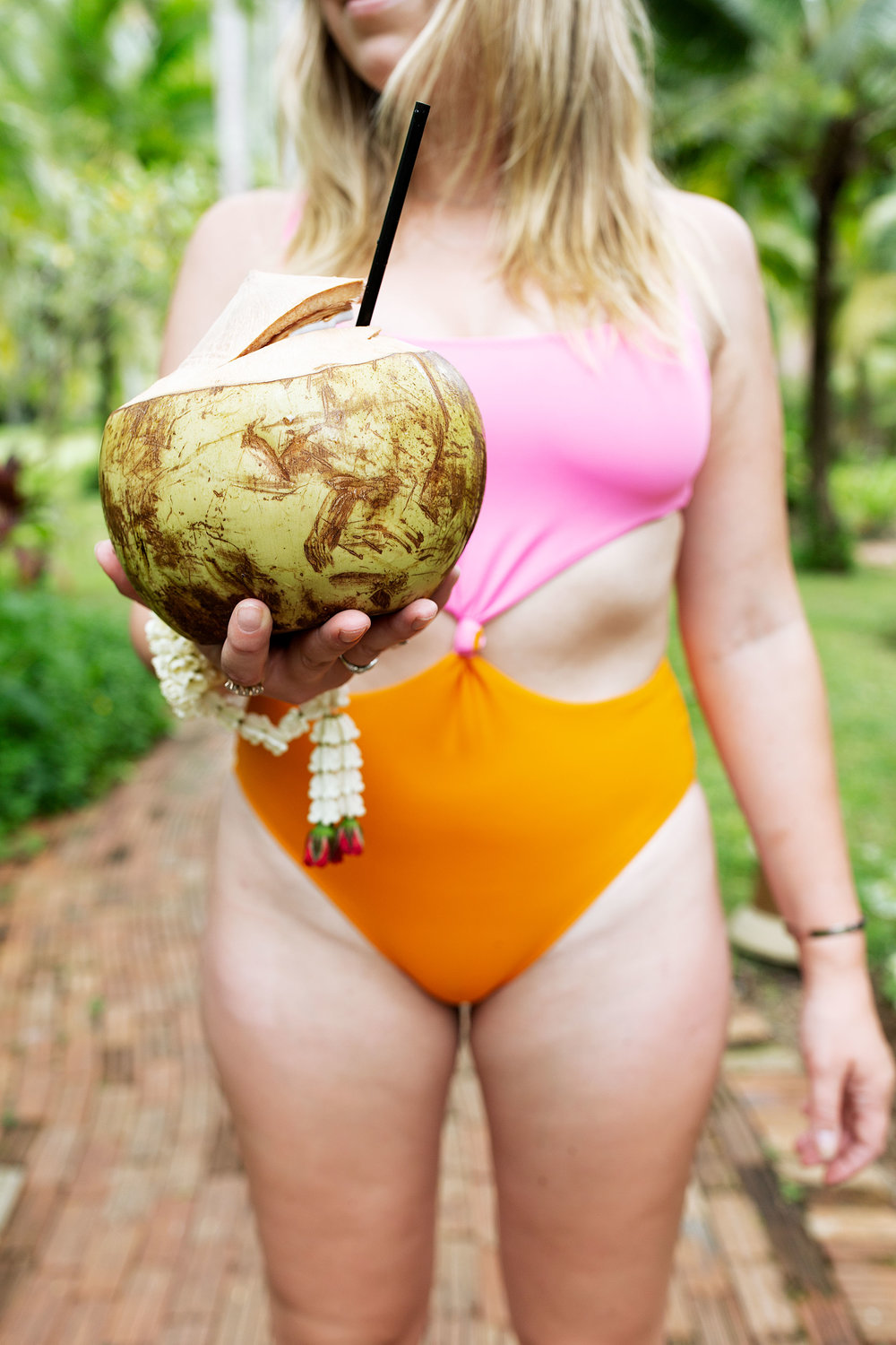 Young coconuts railay beach thailand cooking with cocktail rings