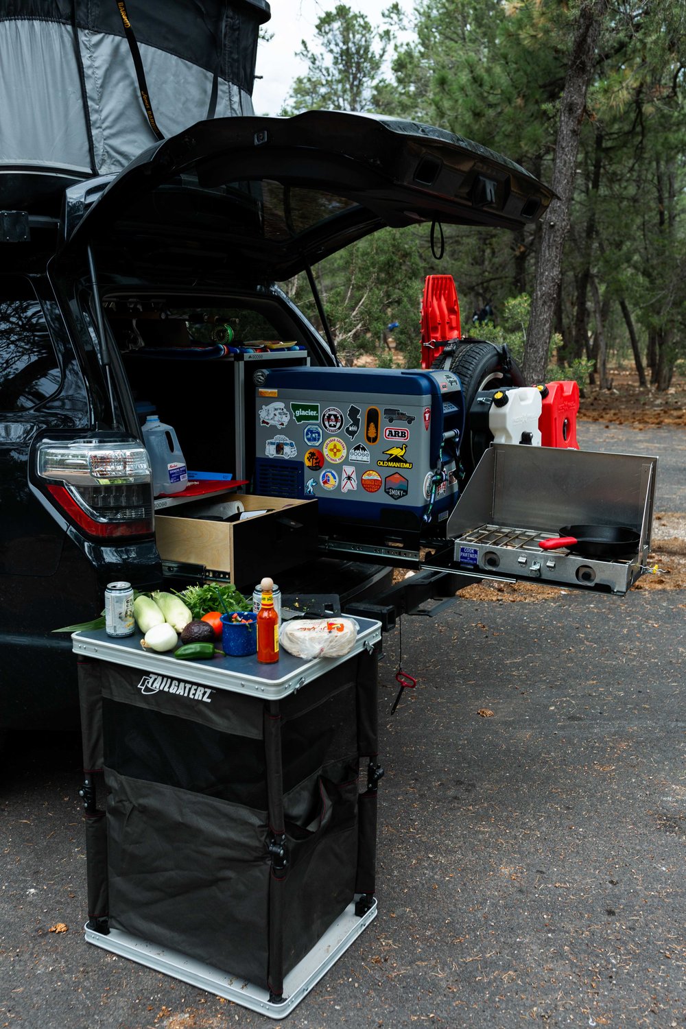toyota 4 runner camping setup with kitchen in trunk