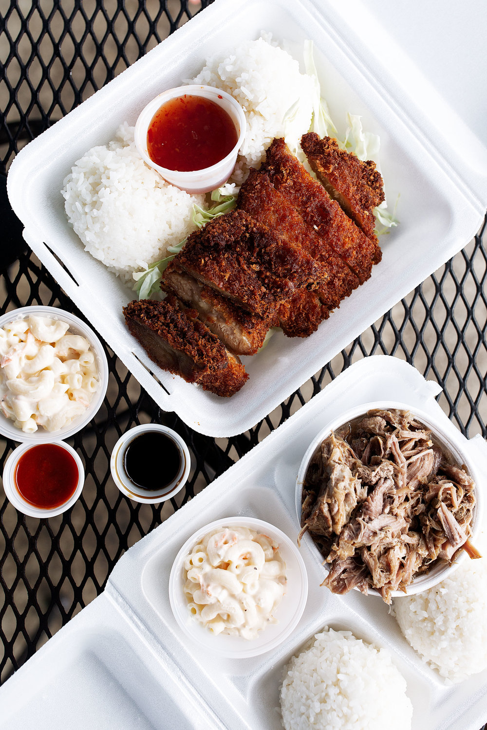 yama's fish market kalua pork and mochiko chicken cooking with cocktail rings travel hawaii