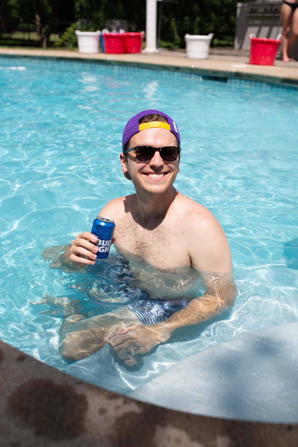 aaron swimming in the pool backyard bbq