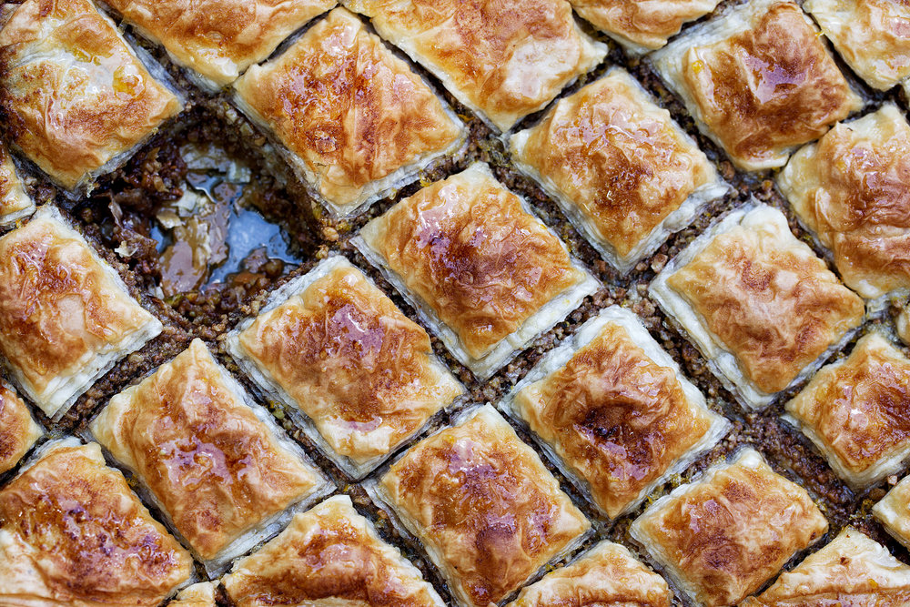 closeup baklava cooking with cocktail rings