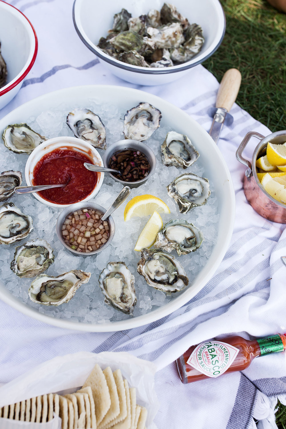 oysters with lemons cocktail sauce and saltines