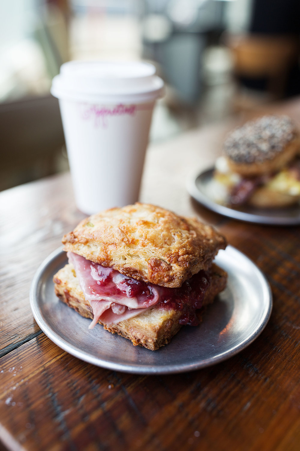 biscuit with gryuere ham and raspberry jam back in the day bakery