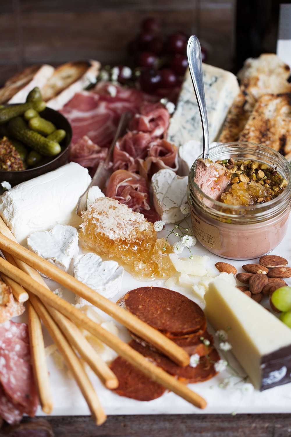 valentine's day cheese and charcuterie board side view