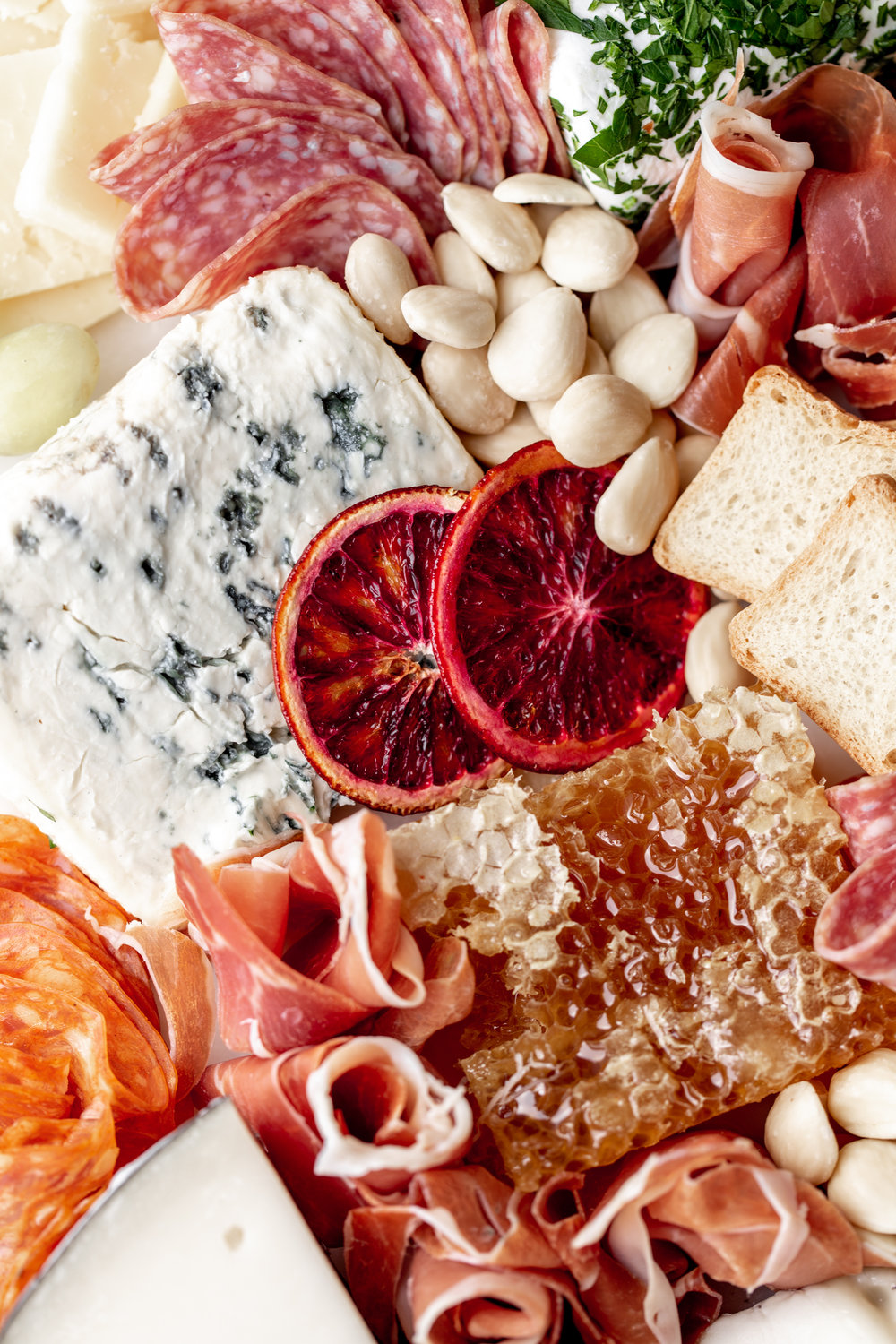 How to put together a cheese and charcuterie board saint agur blue cheese