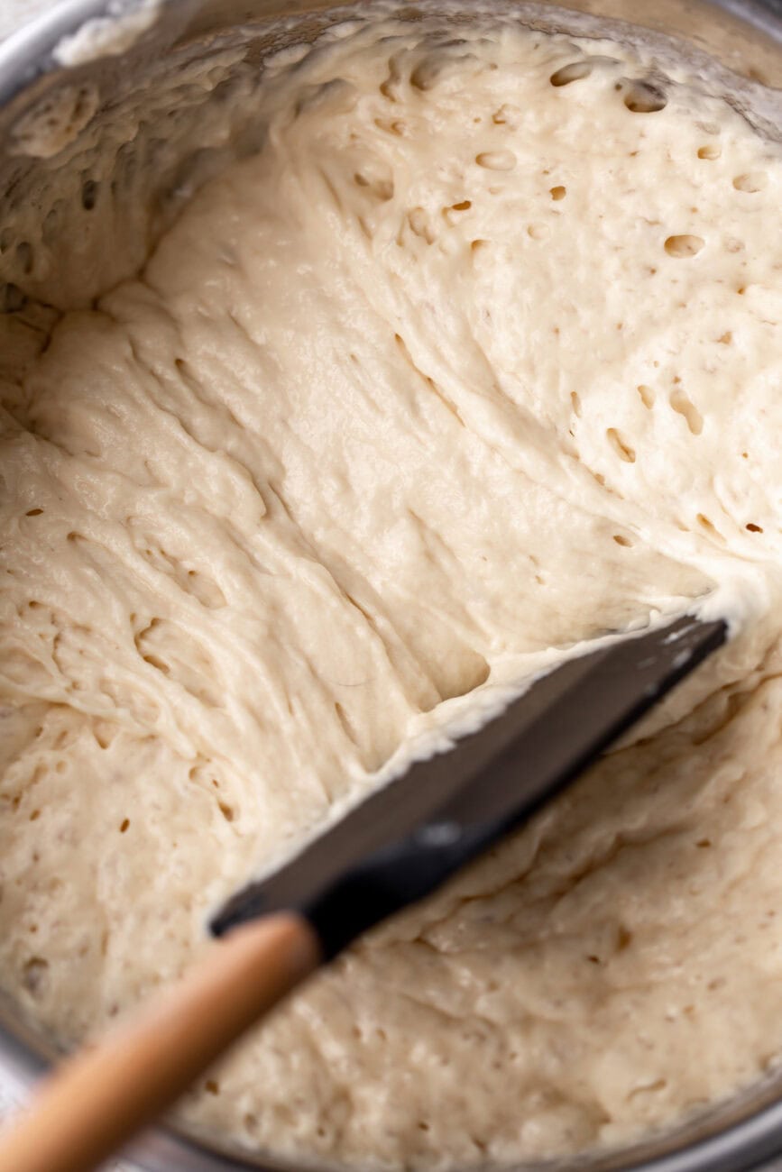 Yeasty waffle batter in mixing bowl.