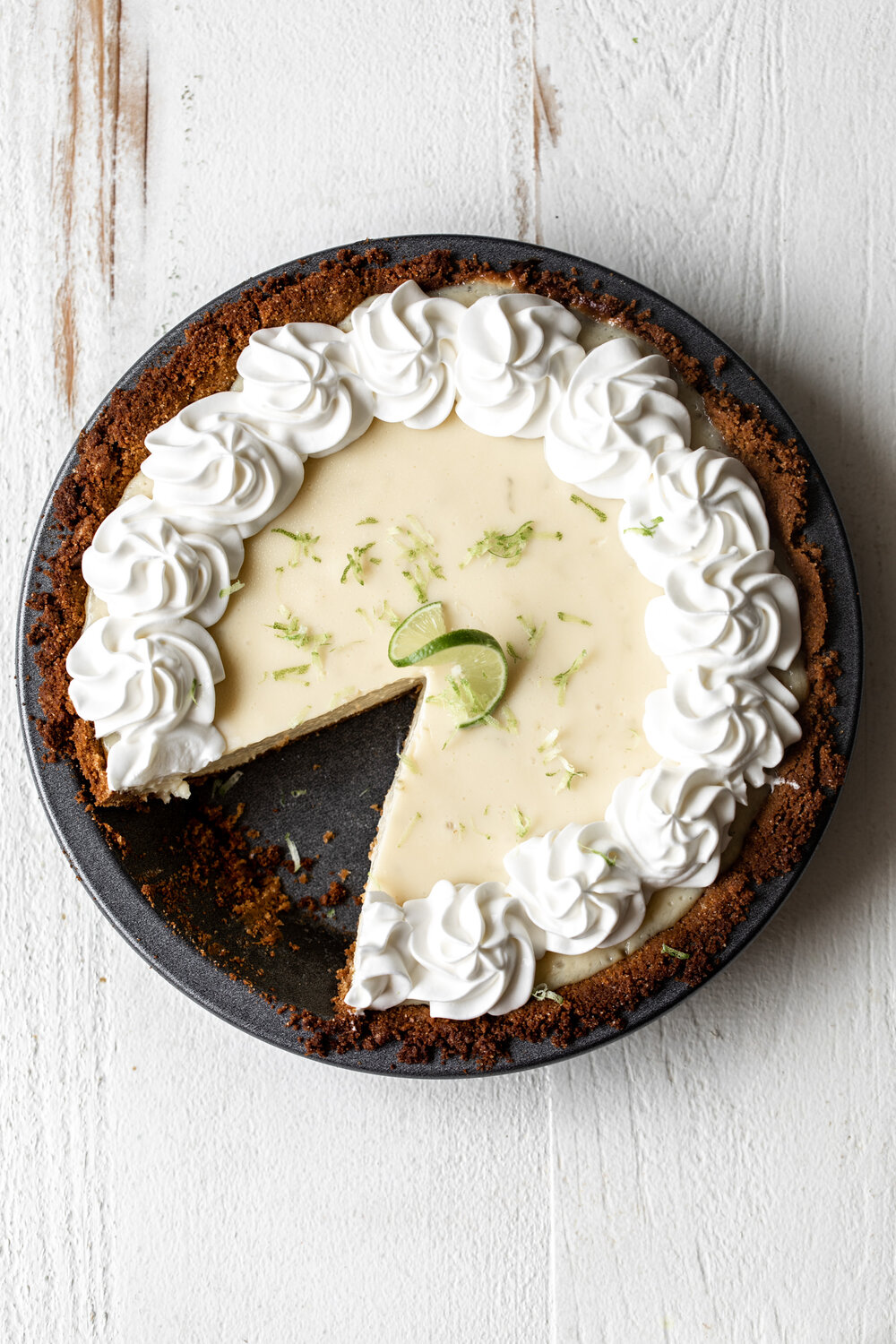 key lime pie with slice removed