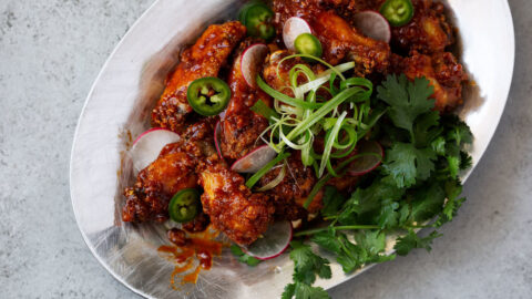 fried sweet chili wings with green onion, cilantro, radish and jalapeño.