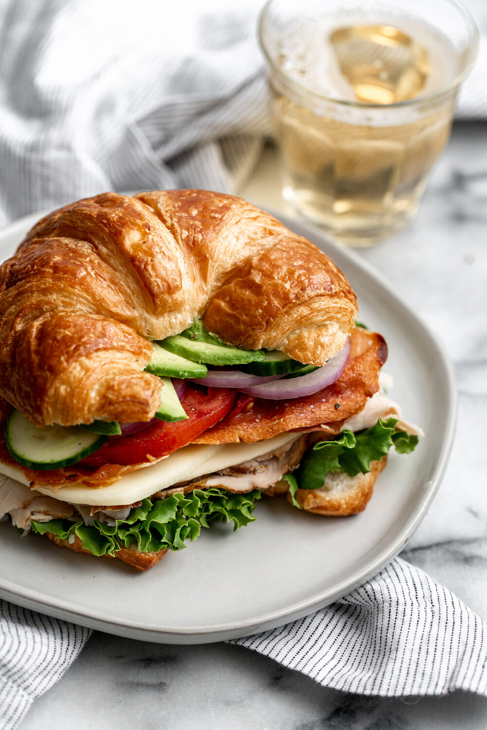 turkey club sandwich with crispy prosciutto closeup