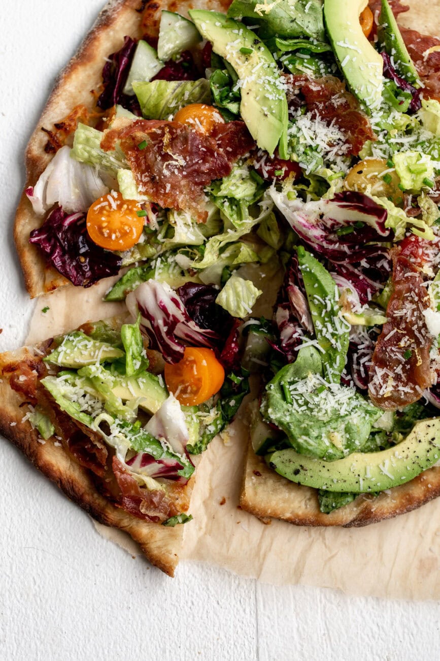 California Salad Pizza with Avocado and Crispy Prosciutto.