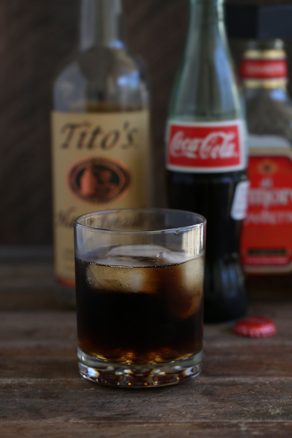 DP shootout made with vodka, coca cola and amaretto in a lowball glass