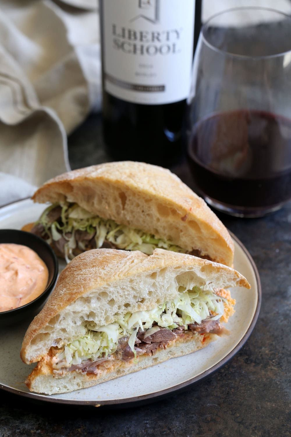lamb sandwich with harissa yogurt sauce