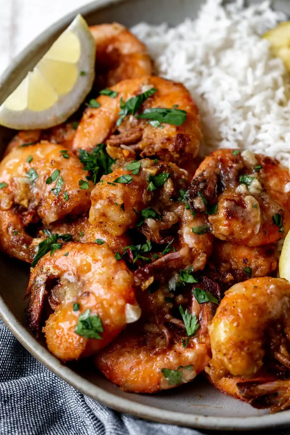 Hawaiian garlic butter shrimp with parsley and lemon