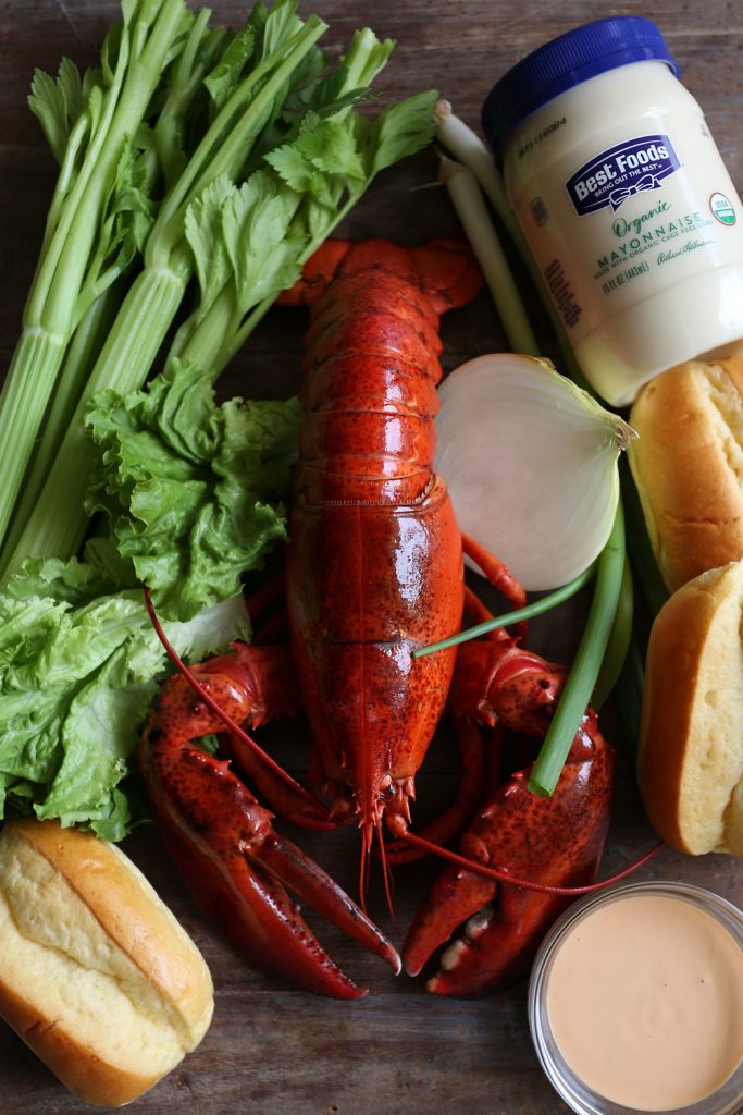 whole lobster with lobster roll ingredients lettuce mini brioche buns spicy mayo and celery