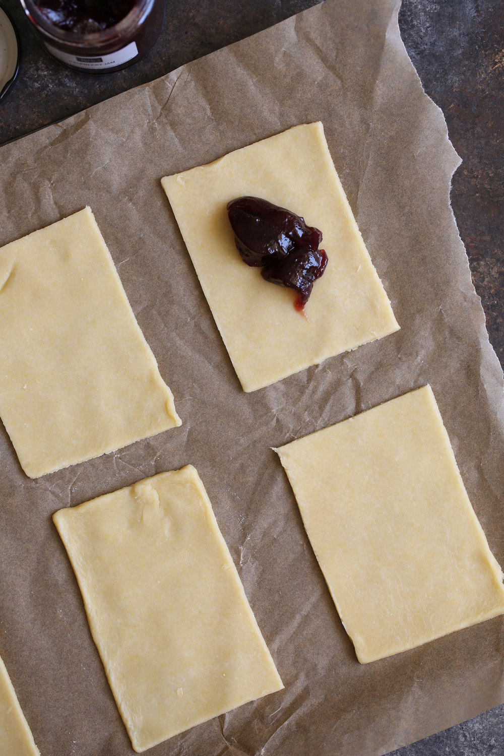 how to fill homemade pop tarts pastry dough cut into rectangles topped with favorite jam