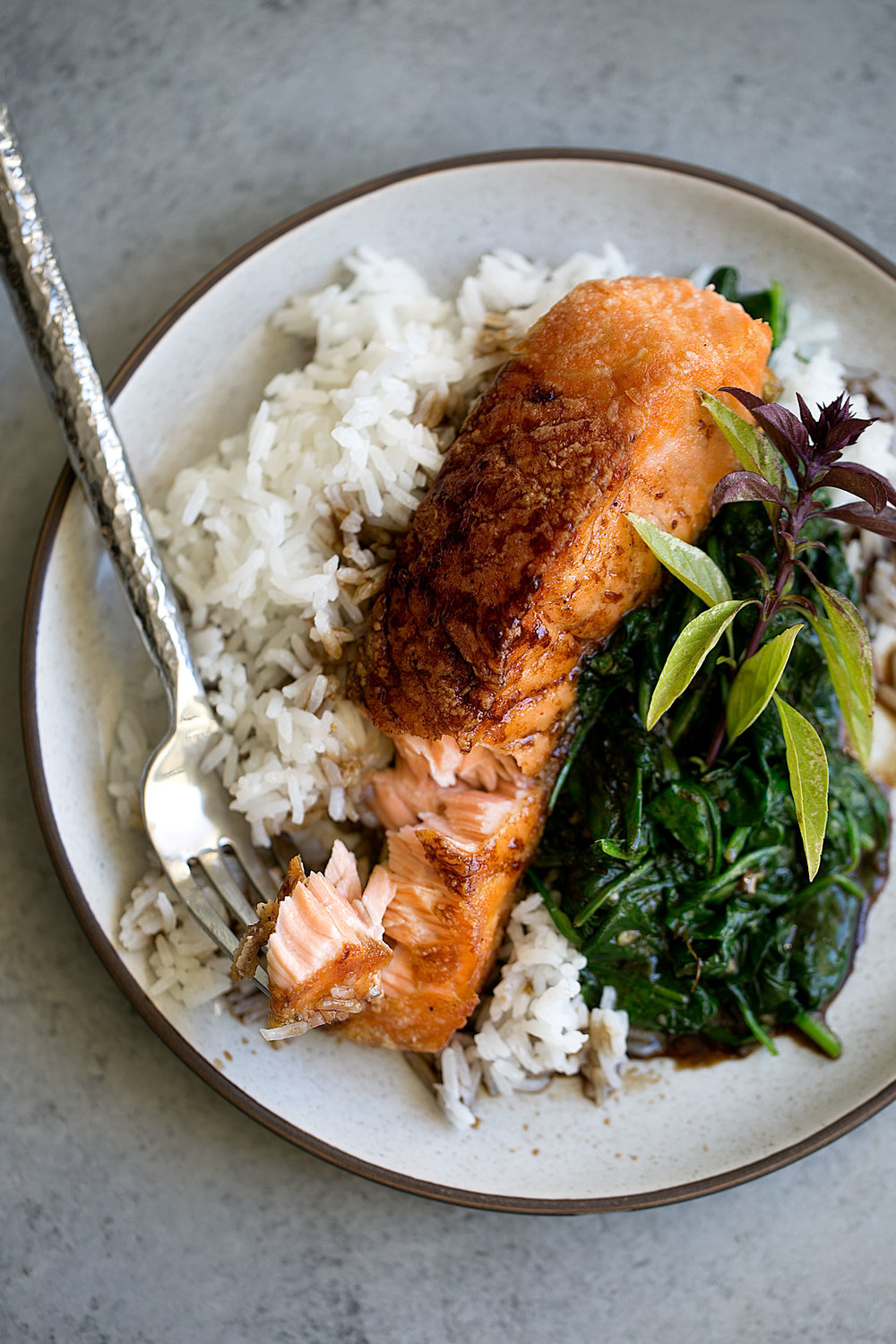 Crispy Salmon With Soy Tamarind Sauce Over Sauteed Spinach Cooking With Cocktail Rings