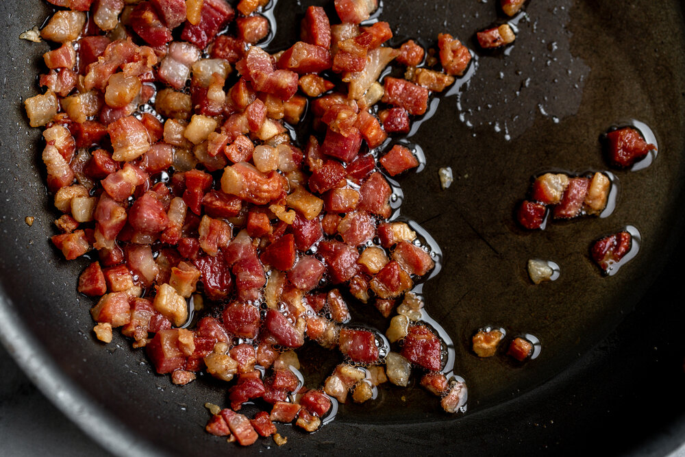 cooking pancetta in sauté pan