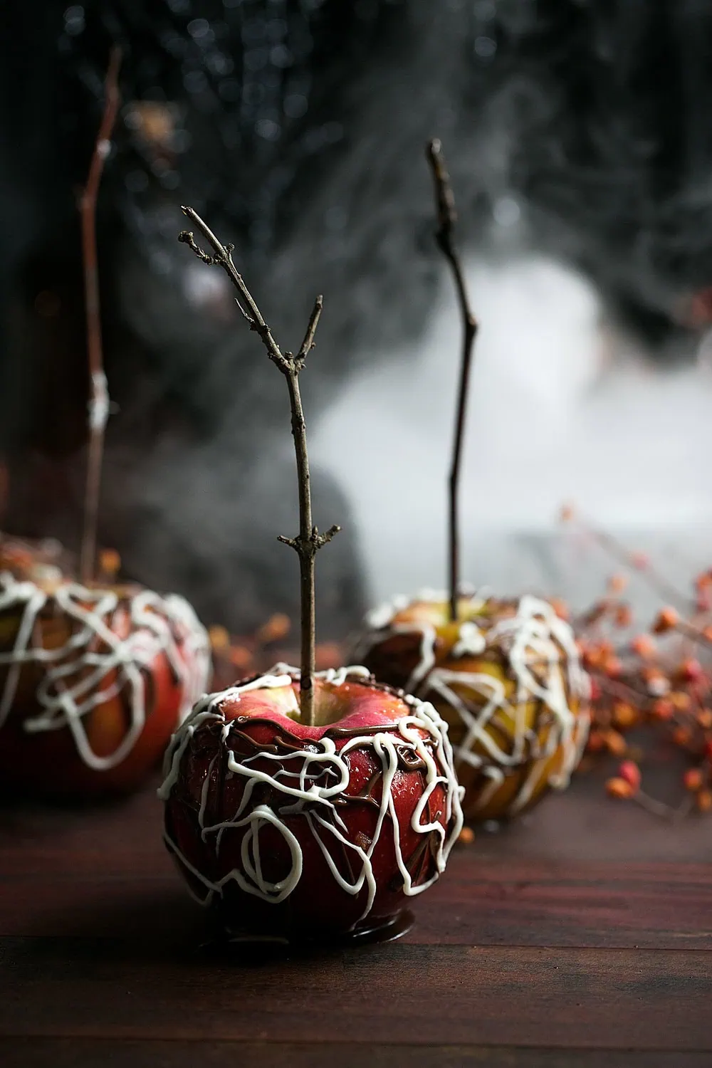 how to make bourbon caramel apples with spider web chocolate
