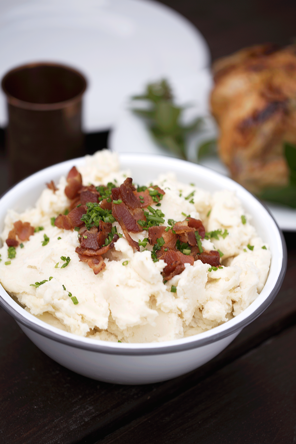 smoked gouda mashed potatoes topped with bacon and chives