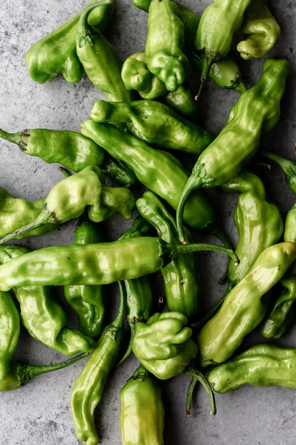 shishito peppers cooking with cocktail rings