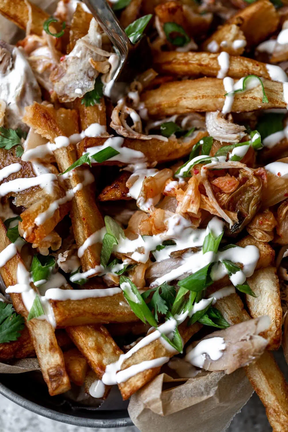 Duck Fat Fries with Duck Confit & Kimchi recipe from cooking with cocktail rings